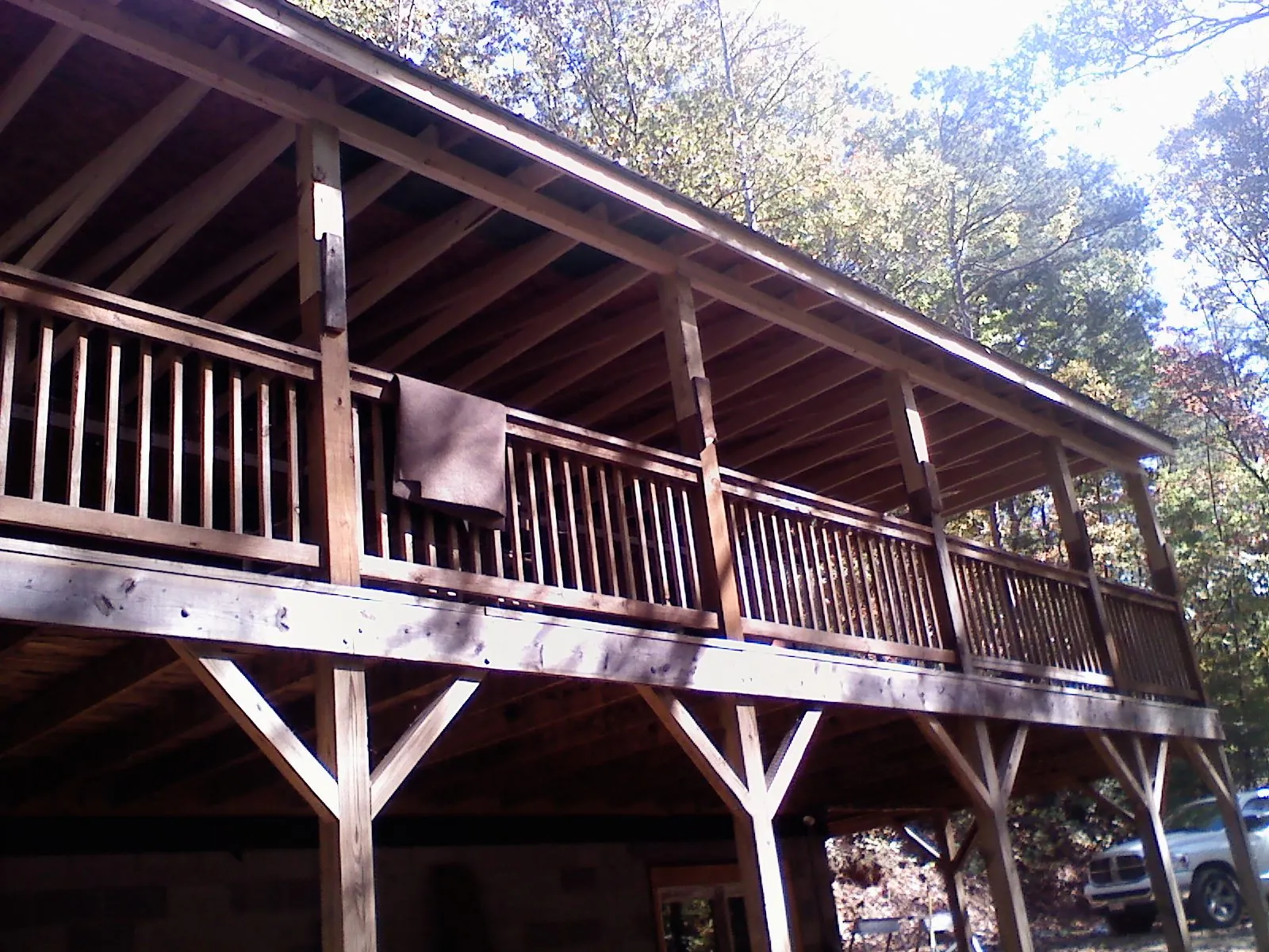 Timber framing under a new elevated porch and deck — Roof Leak Repair in Wrenshall by Roofing Brothers